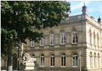 Victoria Hall, Saltaire with one of the four stone lions (Peace)